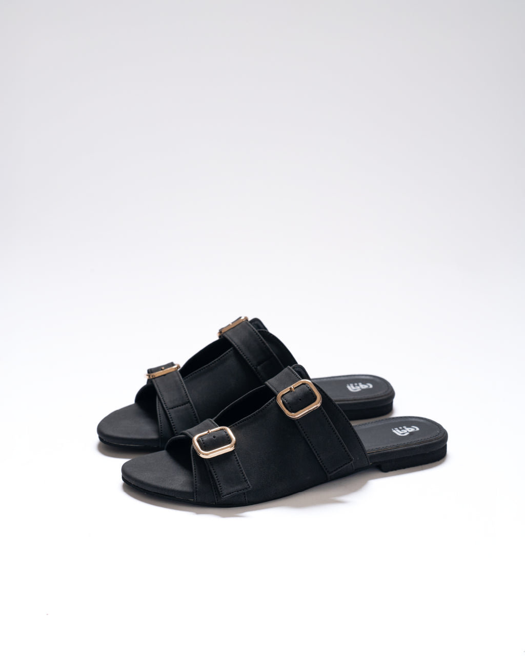 stride-buckle-dusty-black-flat-sandals-urban-commute